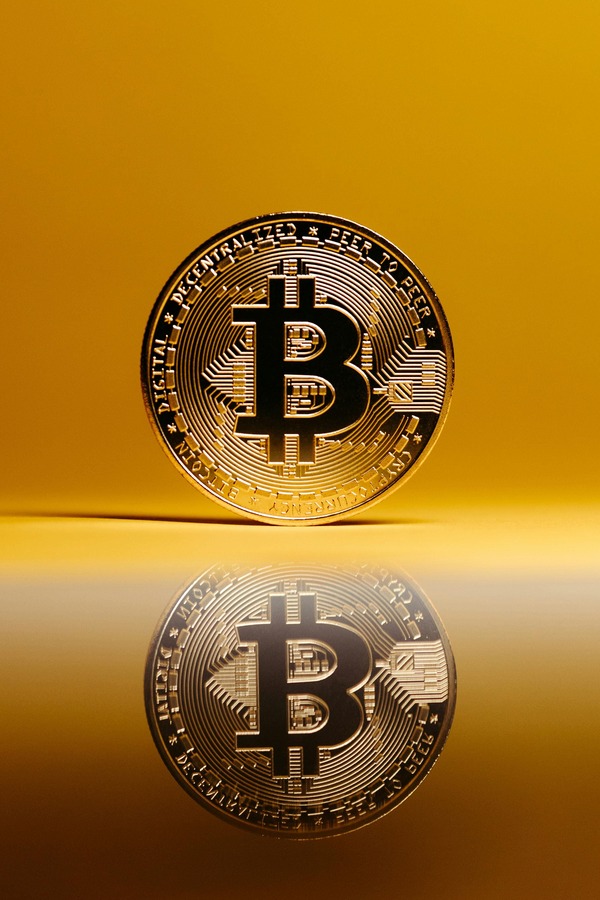 Person reviewing cryptocurrency exchange options on a smartphone